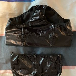 Pleather fabric can hand wash it too small as a medium for me I need a large too